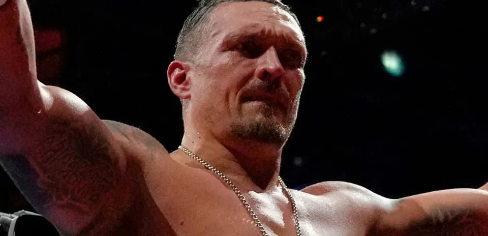 Boxer celebrating victory in the ring