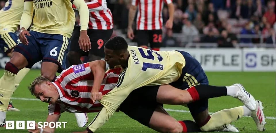 Players contesting for the ball during a match