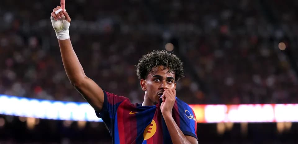 Player celebrating by kissing club jersey