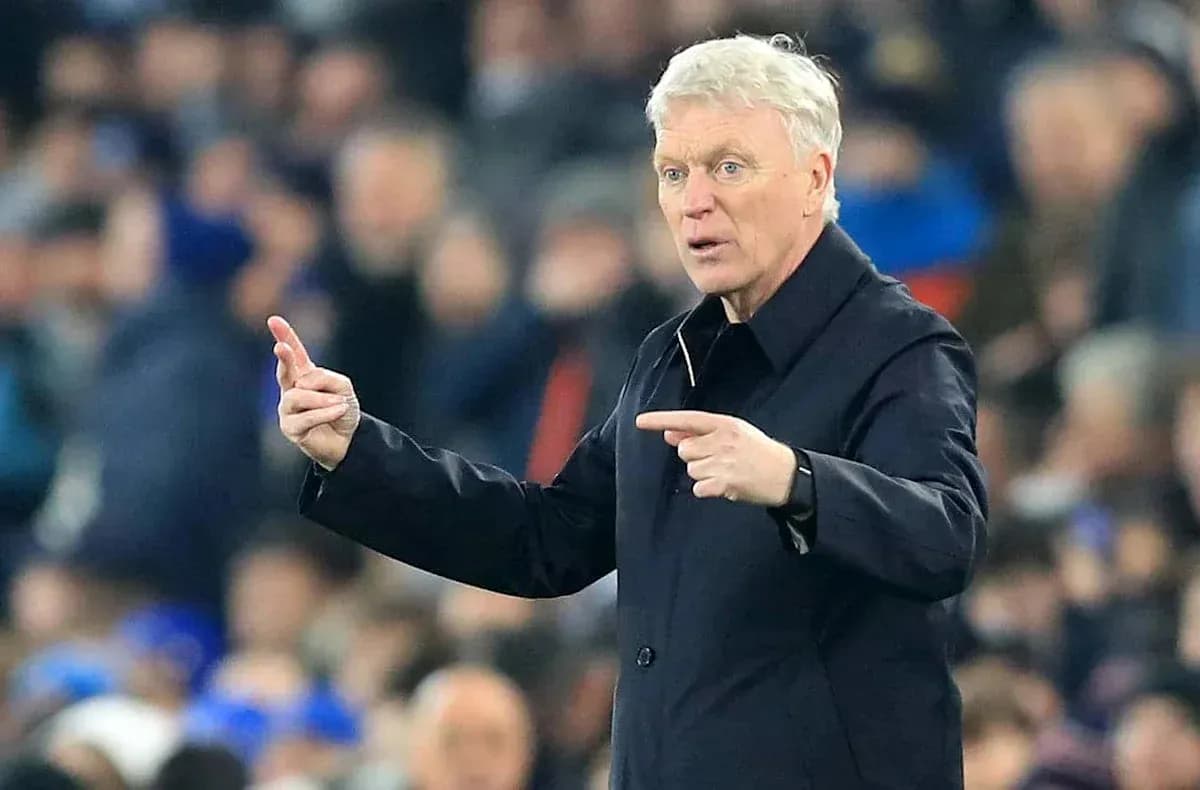 Manager giving instructions on the sidelines during match