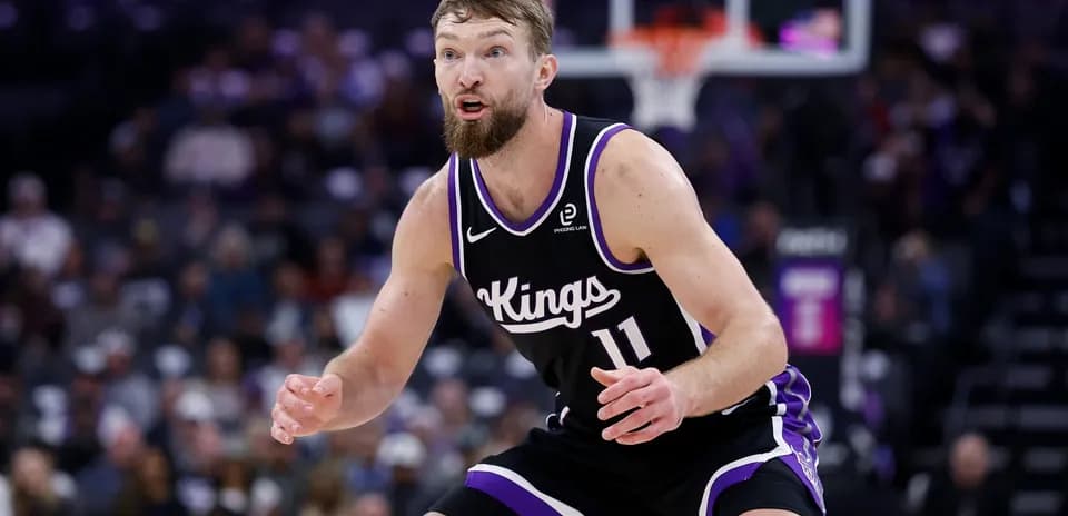 Player in Kings uniform defending during a game