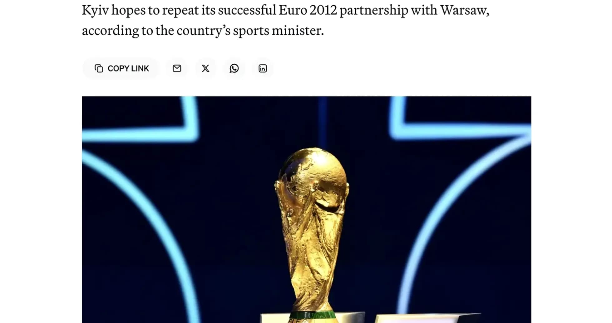 FIFA World Cup trophy displayed on podium