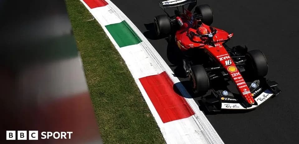 Ferrari car navigating a corner on racetrack