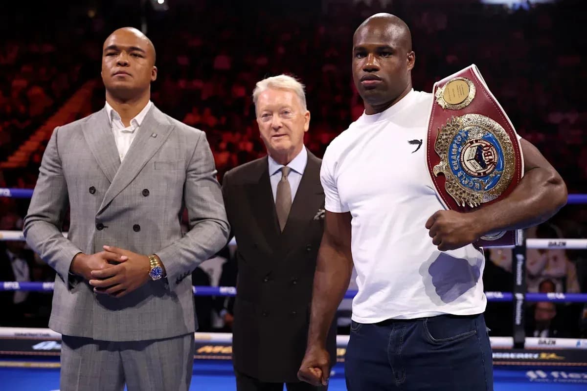 Two boxers and a promoter at a boxing event