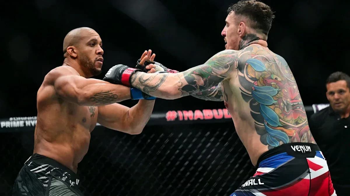 Two fighters exchanging punches in the octagon