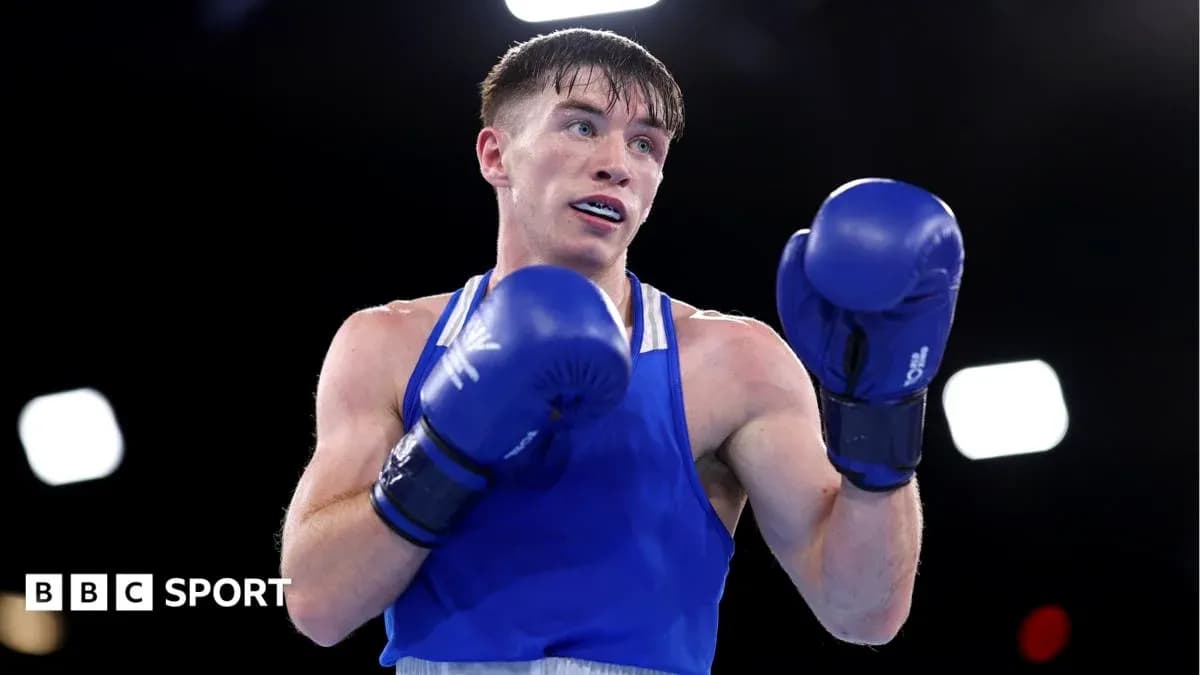 Boxer in blue gloves preparing for match