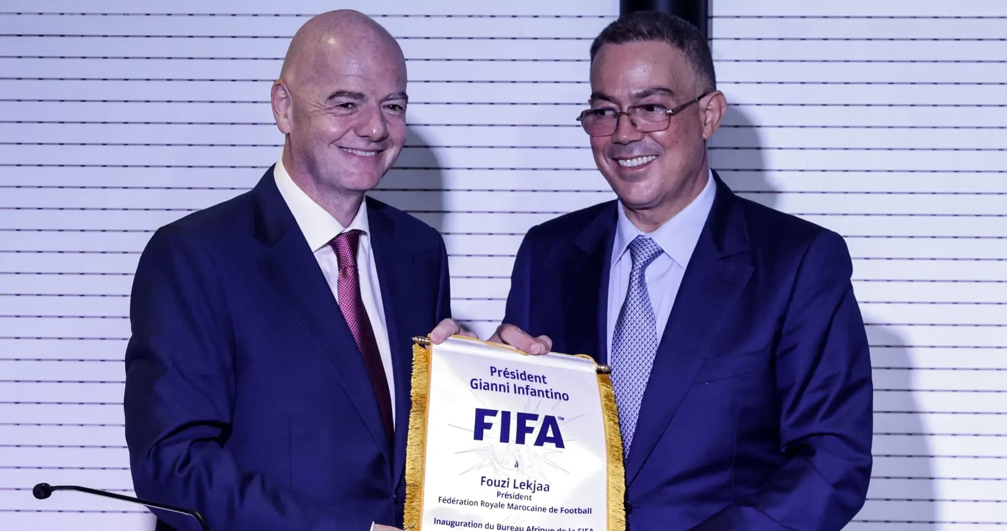Gianni Infantino presenting certificate to Fouzi Lekjaa