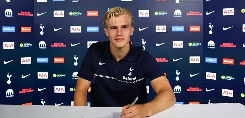 Player signing contract at Tottenham Hotspur announcement
