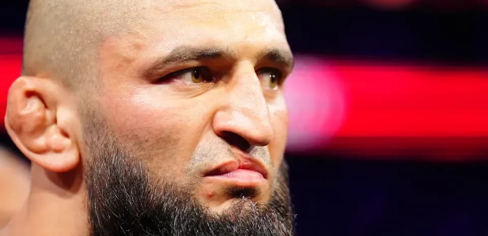 Fighter with beard preparing for match entrance