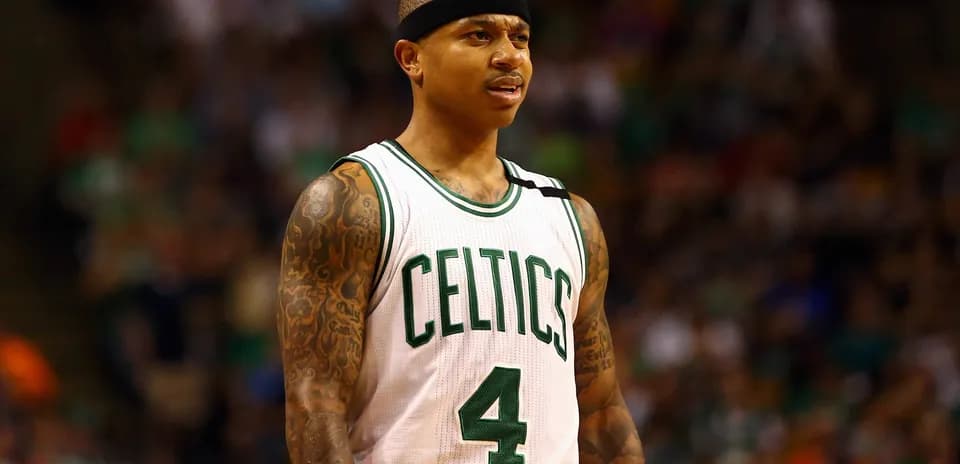 Basketball player in Celtics uniform on court