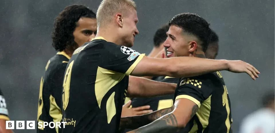 Players celebrating after a goal during match