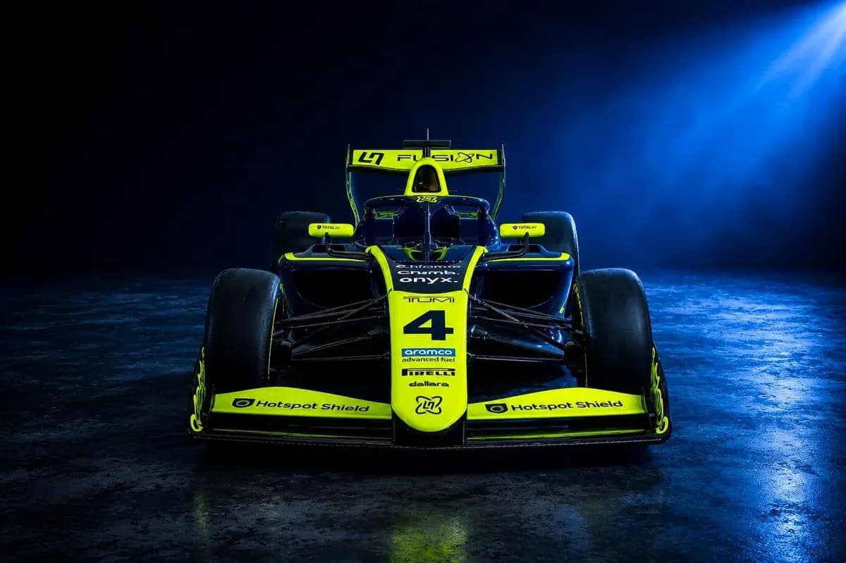 Race car with yellow and black design on display