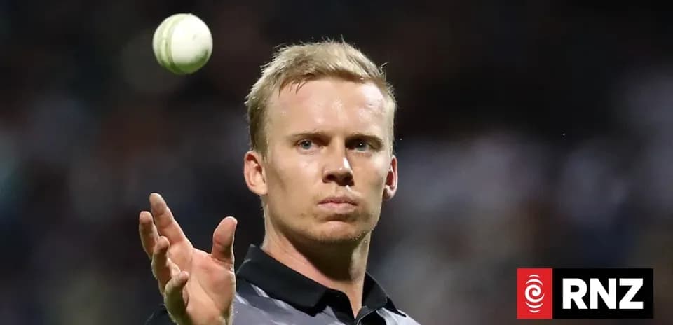 Umpire throwing a cricket ball during match