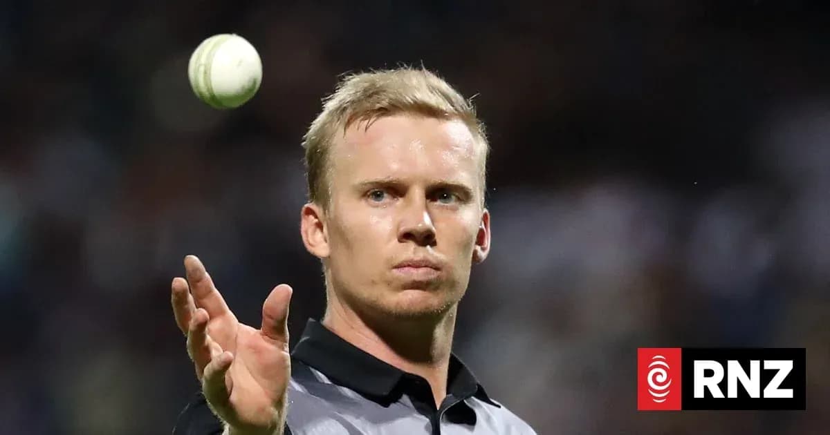 Umpire throwing a cricket ball during match