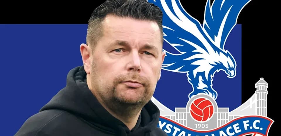 Man in hoodie with Crystal Palace logo background