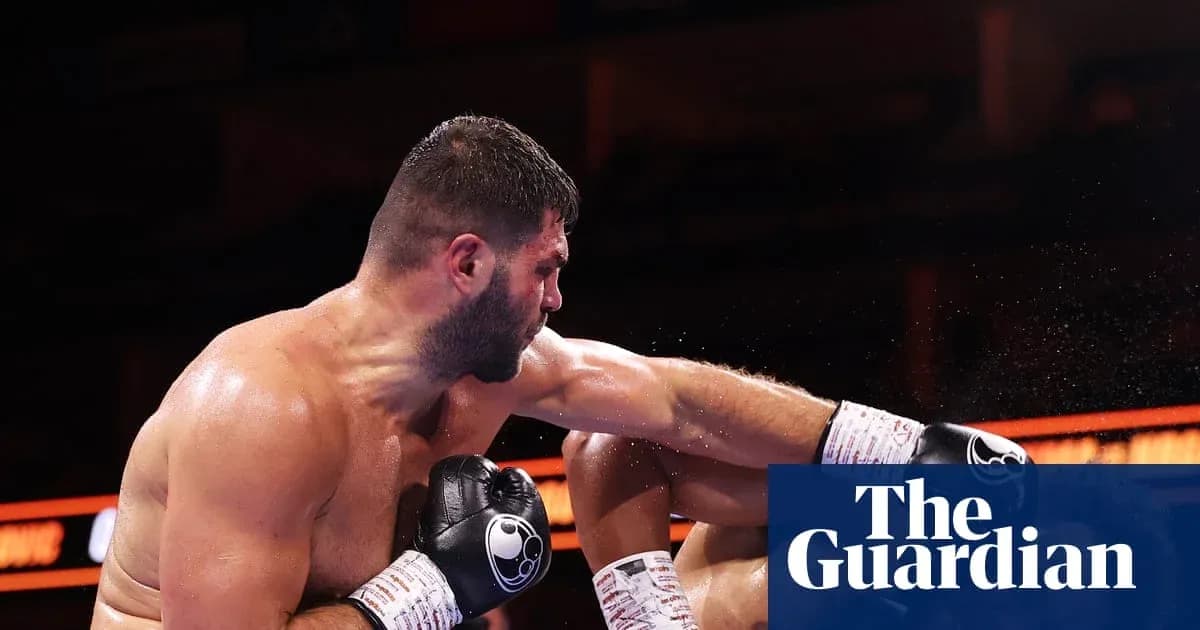 Boxer delivering a punch during a match