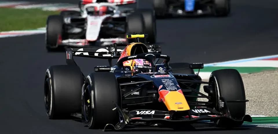 Formula 1 cars racing on track during competition