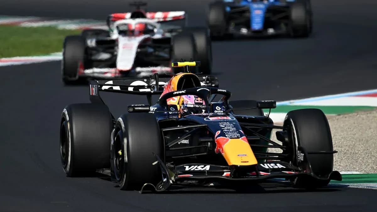 Formula 1 cars racing on track during competition