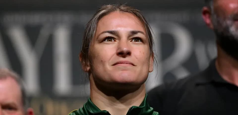 Female athlete with serious expression at event