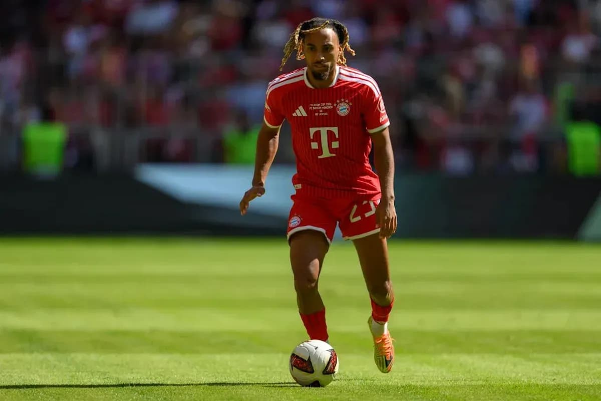 Player dribbling ball on field during match