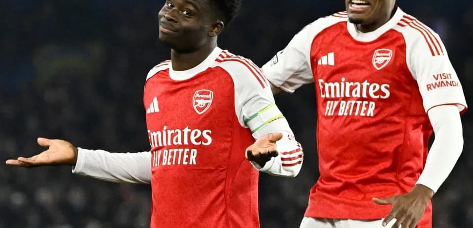 Arsenal players celebrating during Premier League match