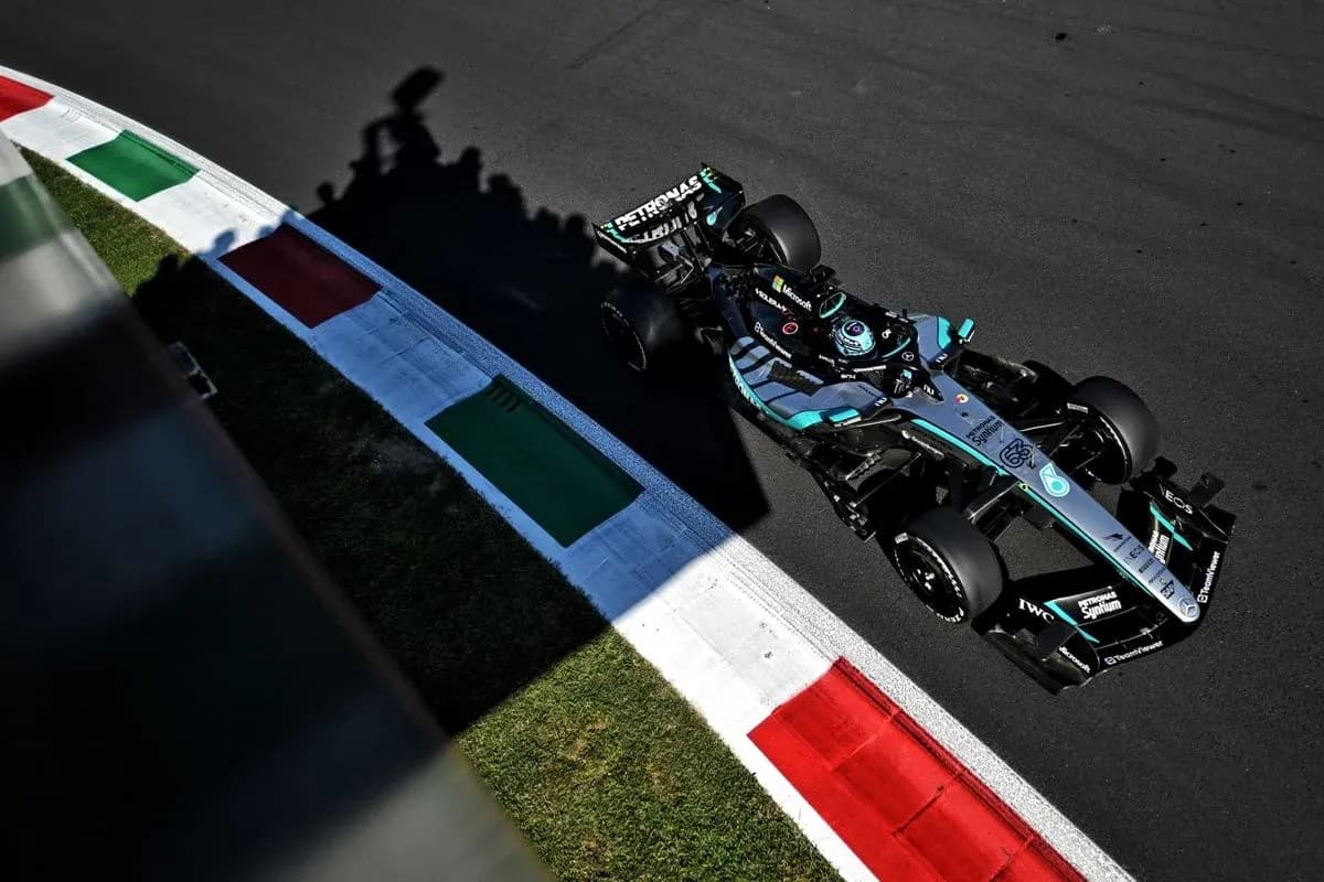 Formula 1 car navigating a corner on track