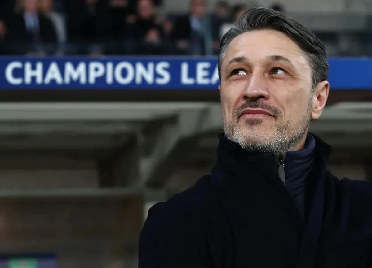 Coach observing match during Champions League event