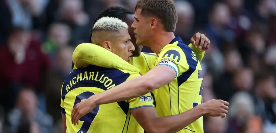 Tottenham players celebrating a goal together