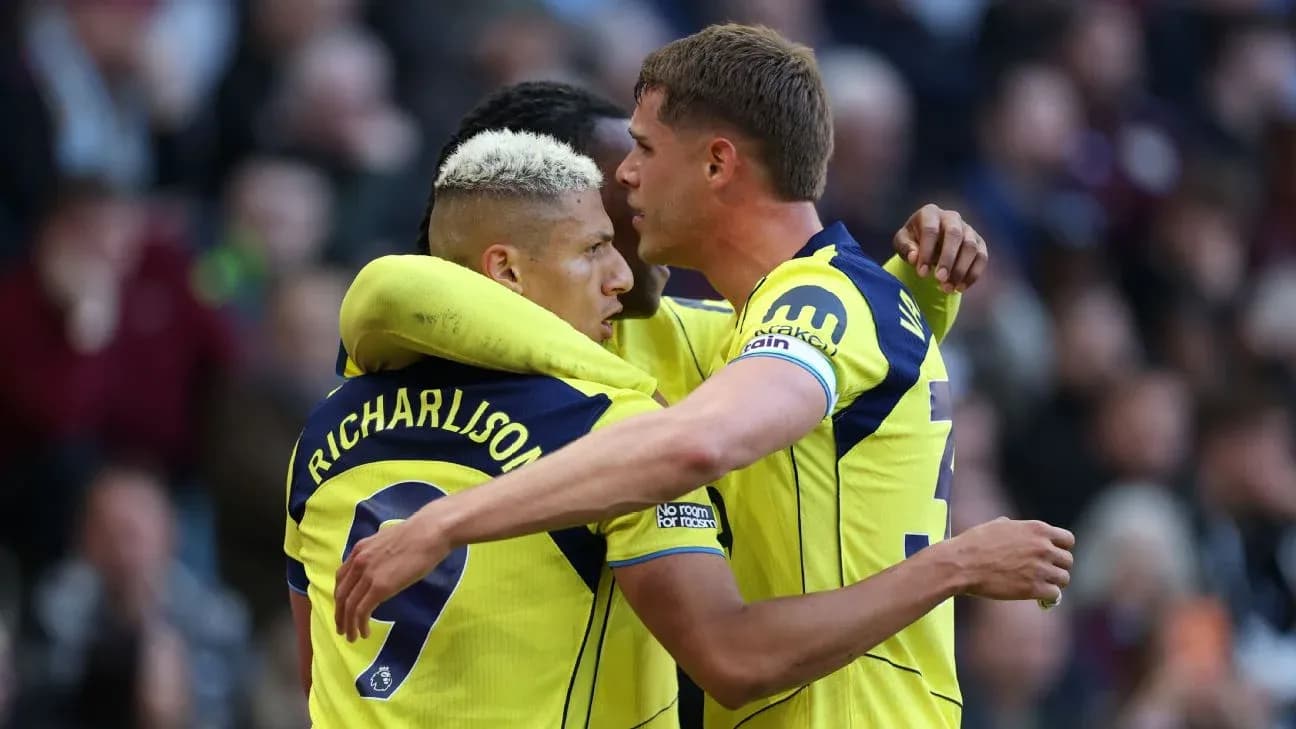 Tottenham players celebrating a goal together