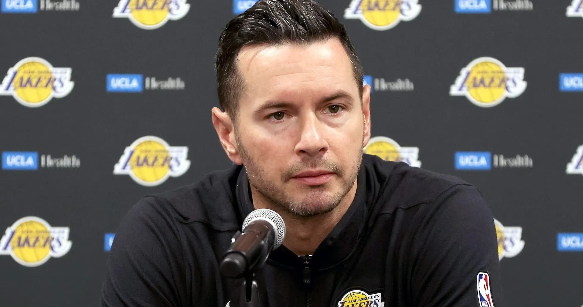 Coach speaking at Los Angeles Lakers press conference