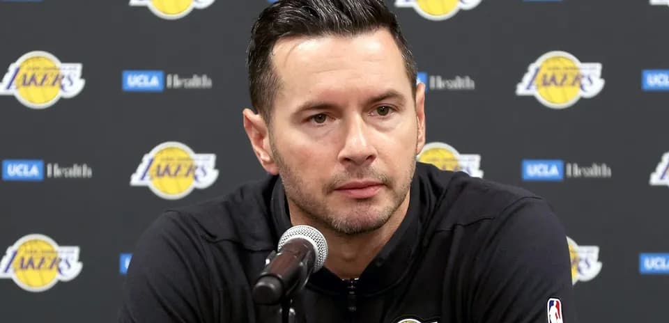 Coach speaking at Los Angeles Lakers press conference