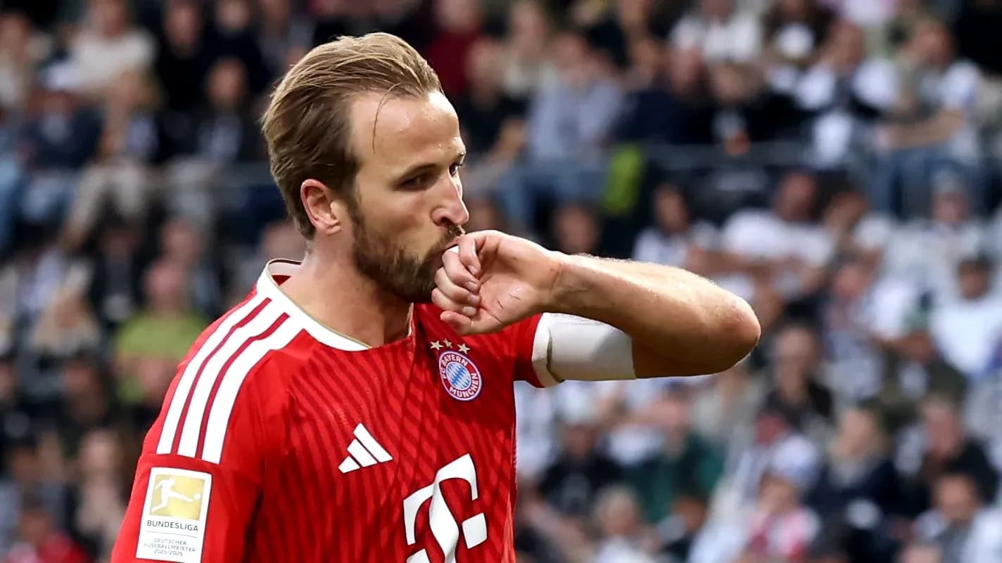 Player celebrating by kissing his wrist during match