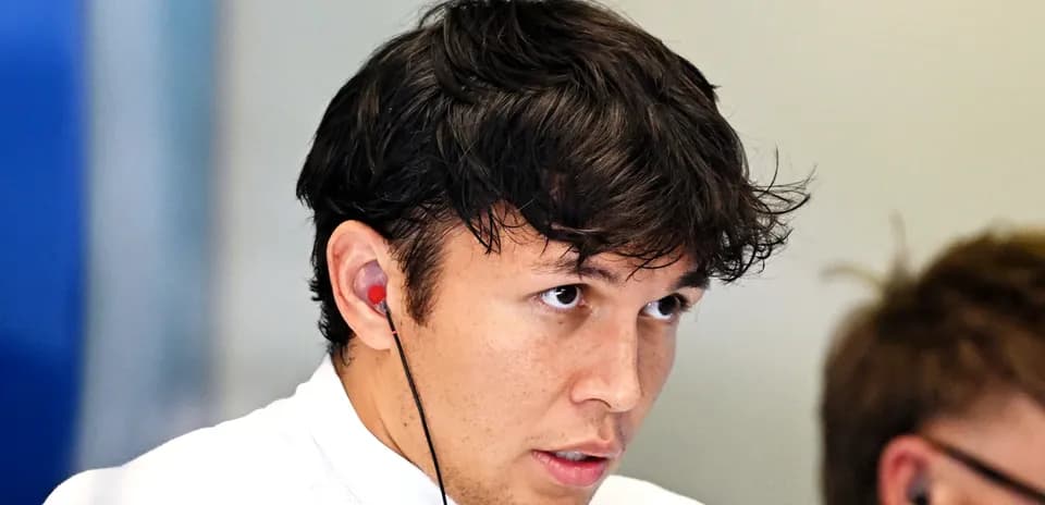 Driver focused during a team meeting with headphones