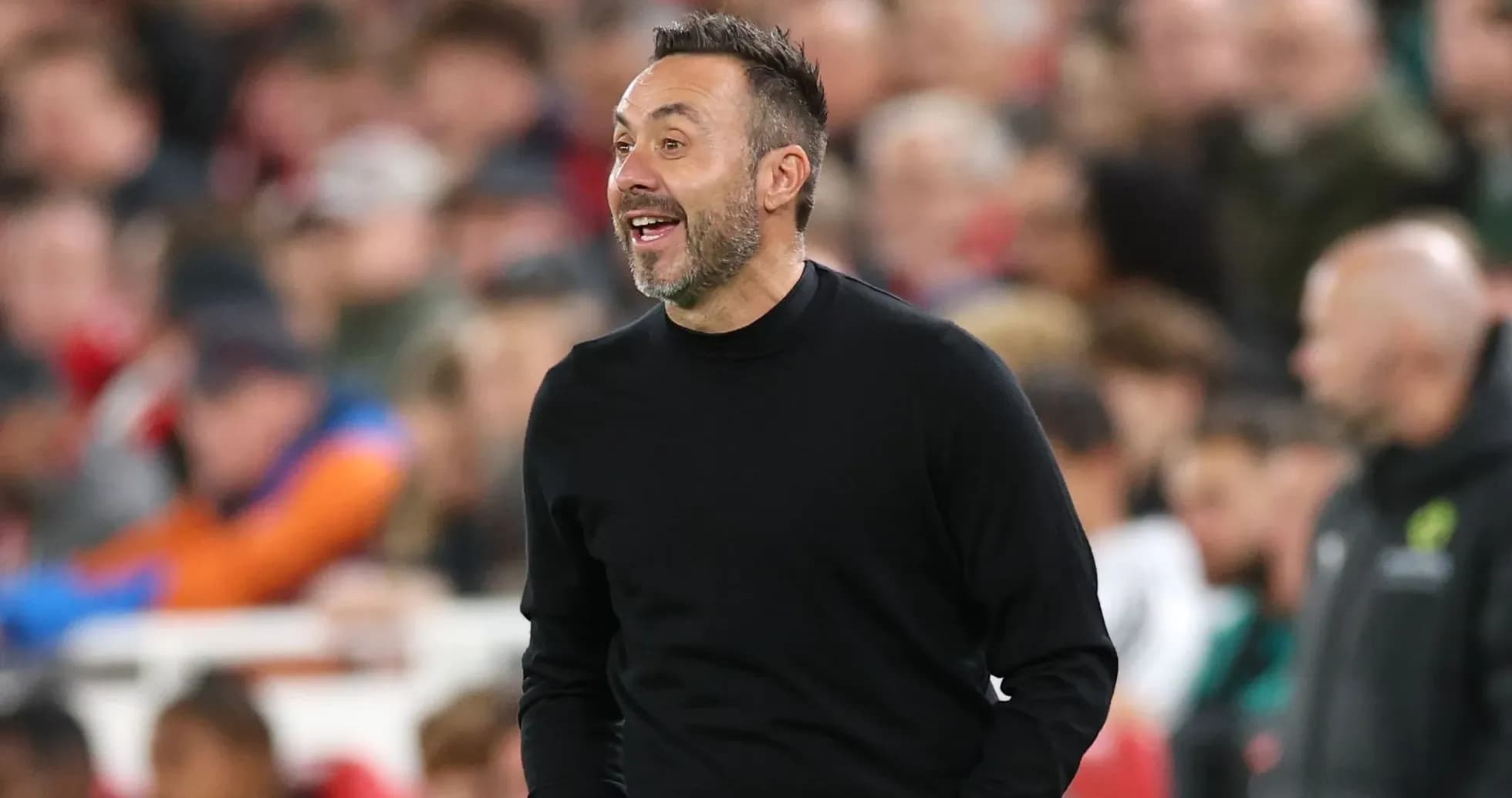 Coach directing players during a match