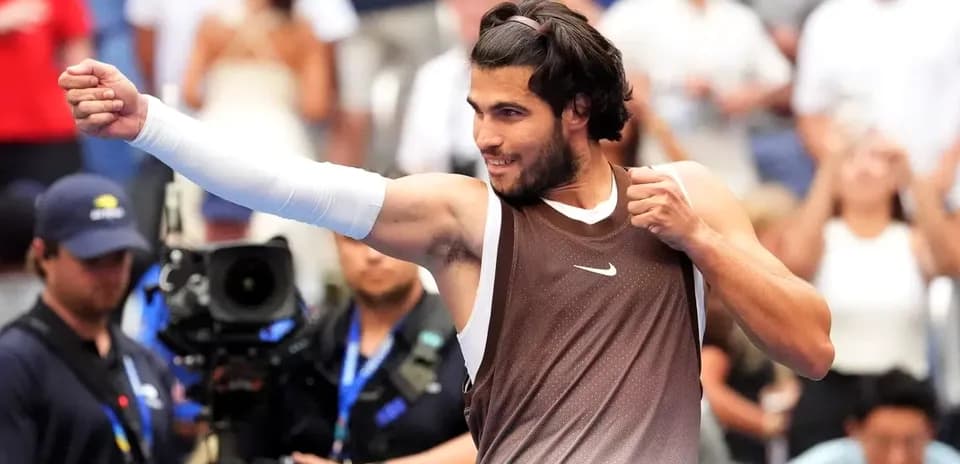 Tennis player celebrating after a match victory