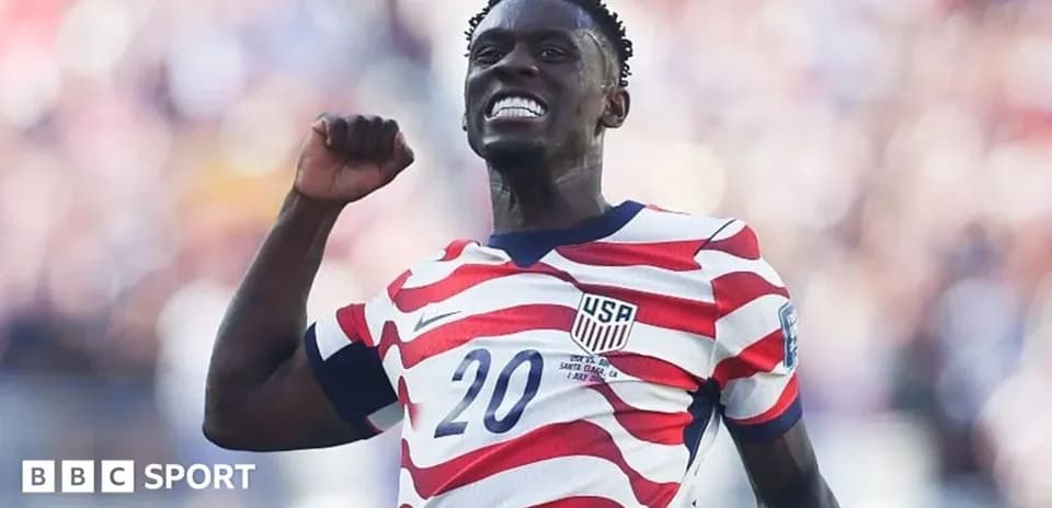 Player celebrating a goal wearing USA jersey