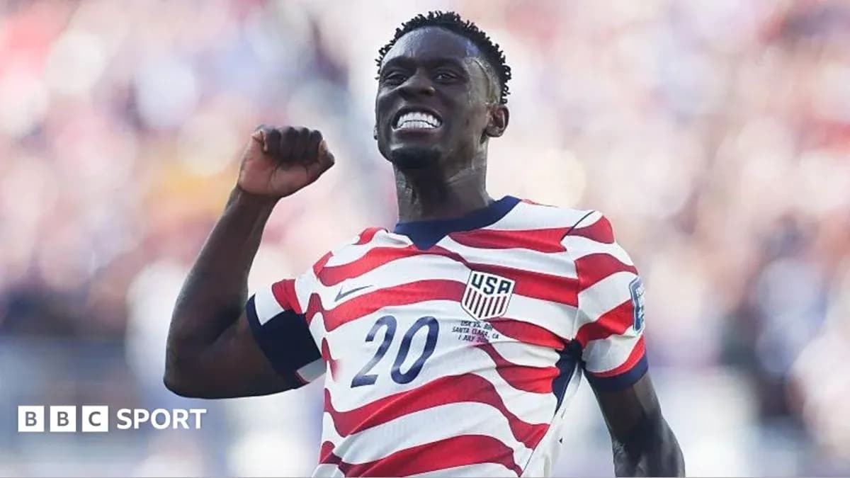Player celebrating a goal wearing USA jersey