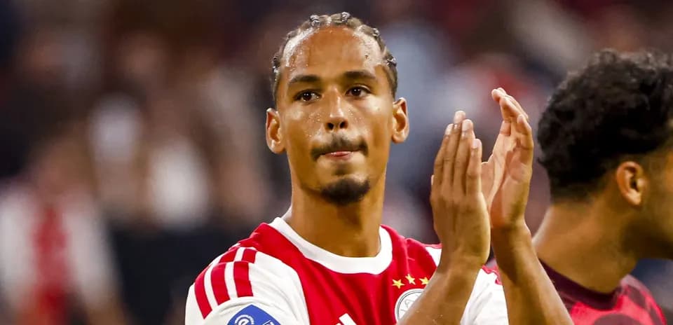 Player applauding fans after the match