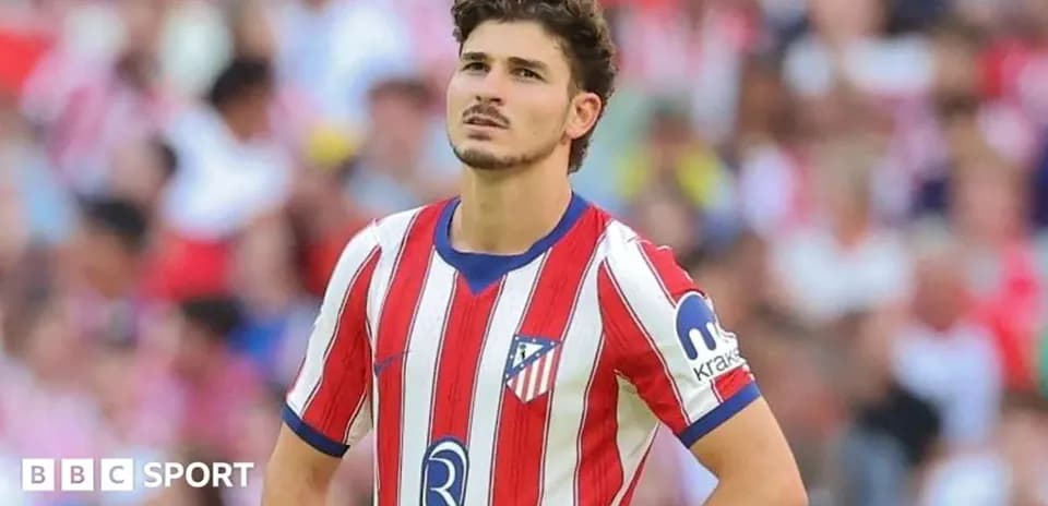 Player in Atletico Madrid jersey during match