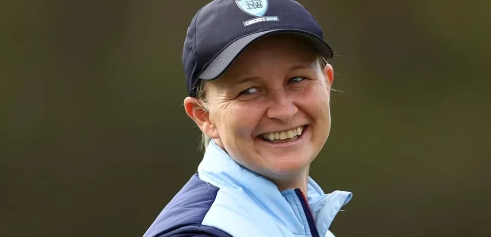 Cricket player smiling during a training session