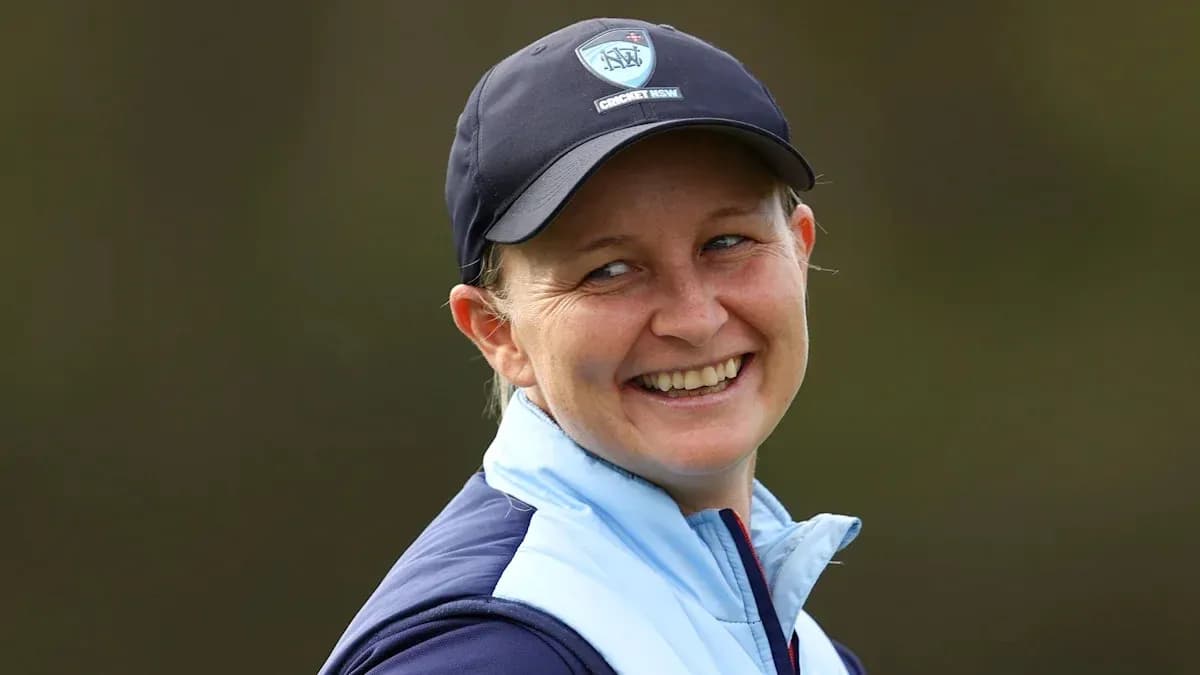Cricket player smiling during a training session