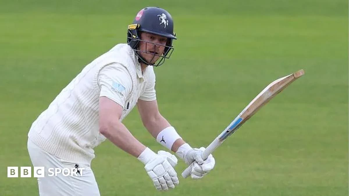 Batsman preparing to hit the ball on field