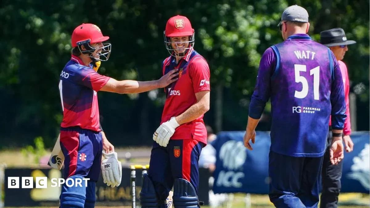 Players discussing during a cricket match on field