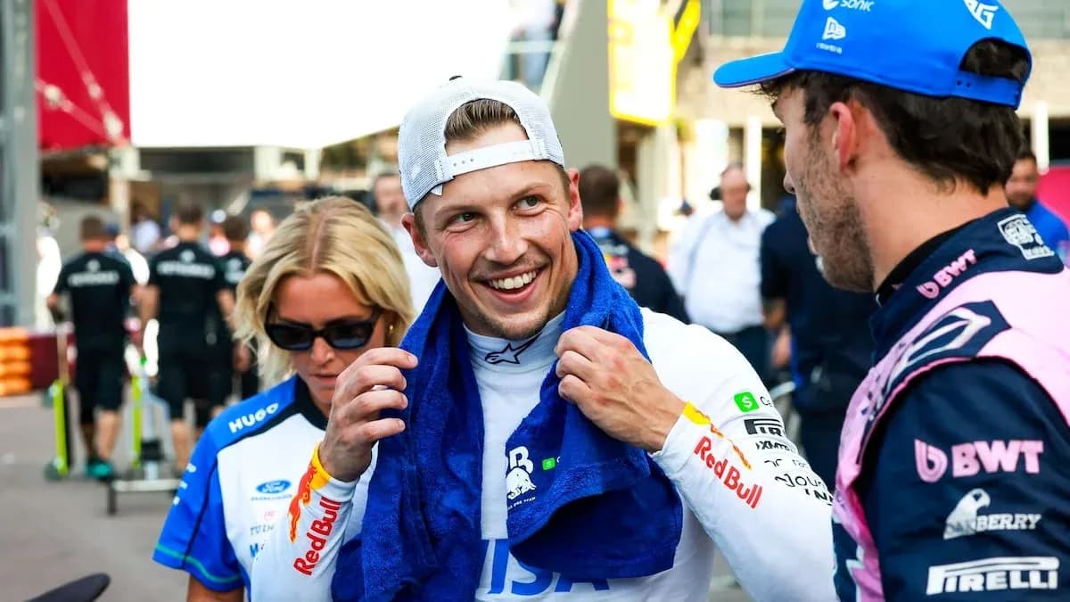Drivers chatting in paddock after race event