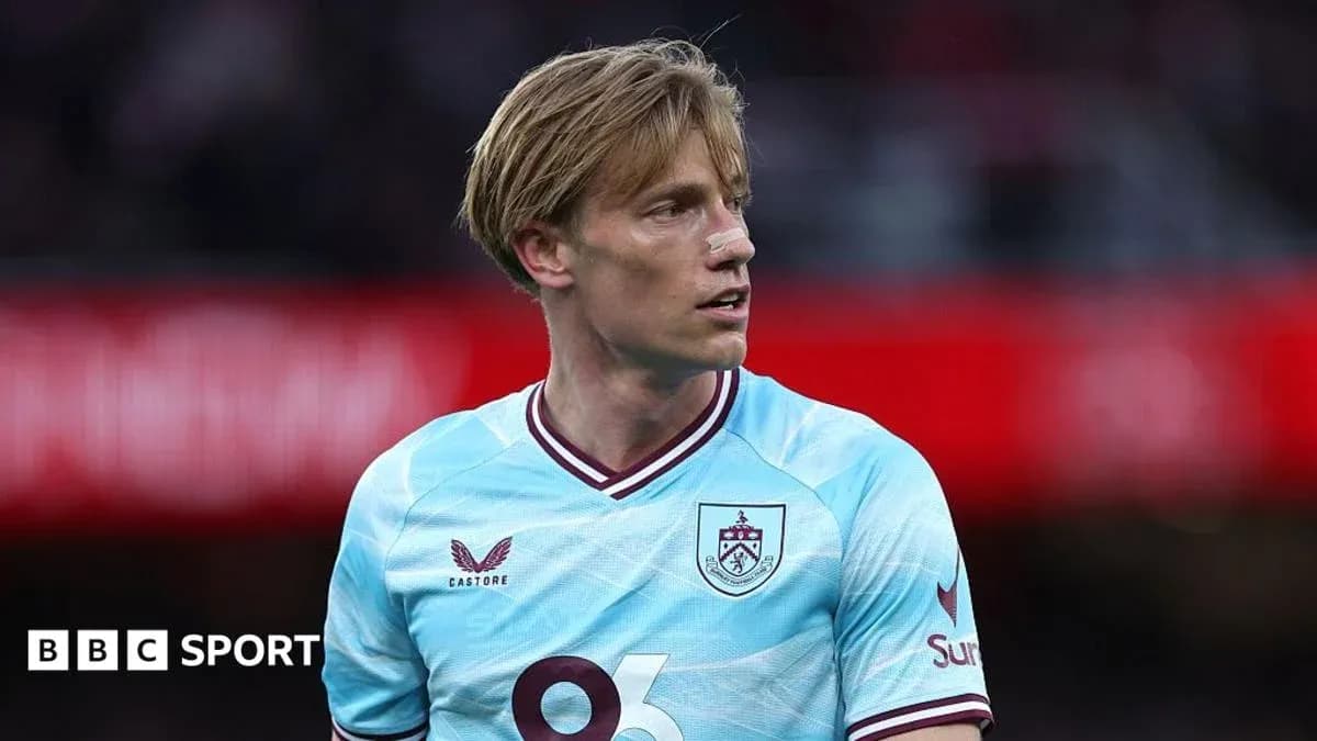 Player in Burnley kit during match action