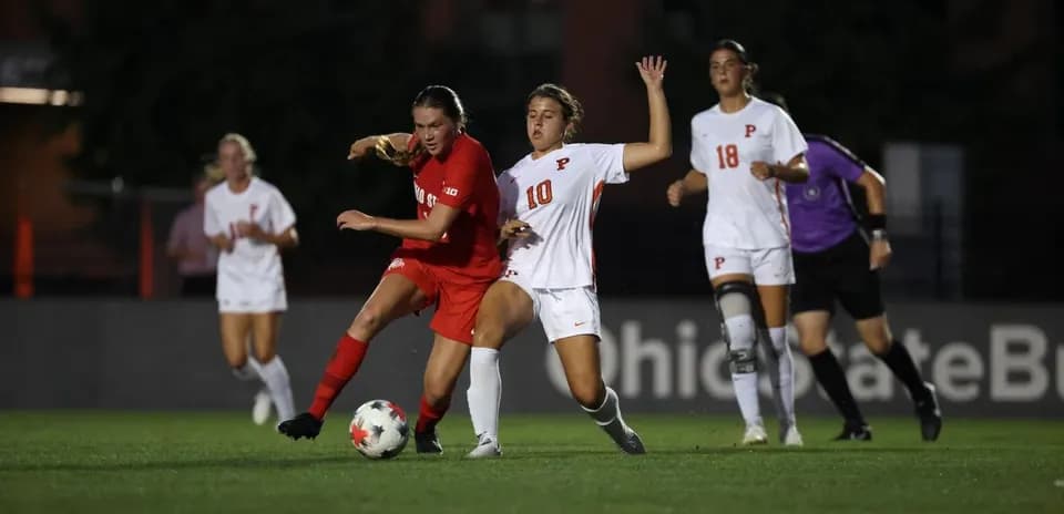 Players competing for the ball during a soccer match