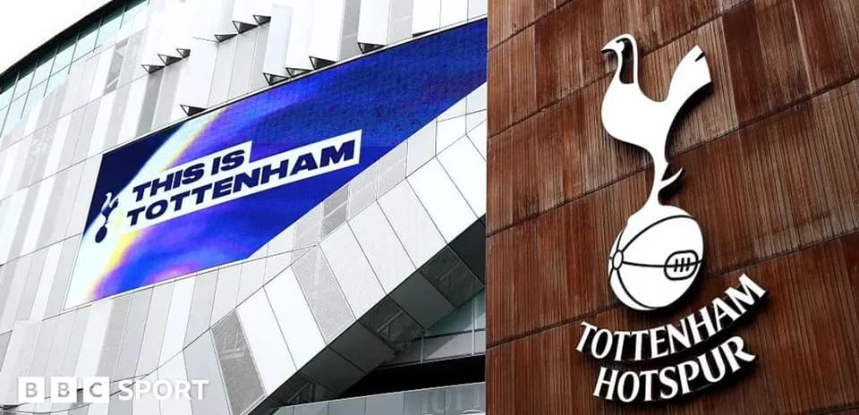 Tottenham Hotspur logo and banner outside stadium