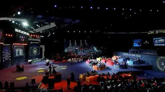 IPL auction event with teams and audience present