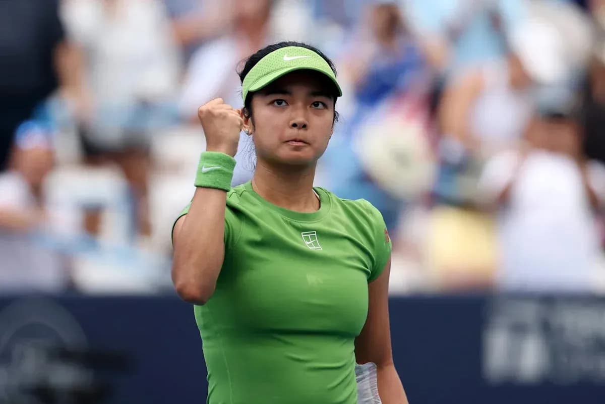 Tennis player celebrating during a match