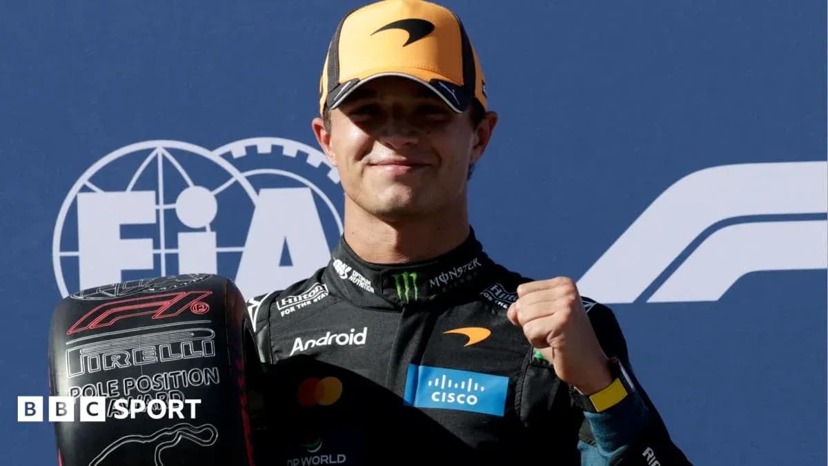 Driver celebrating with pole position tire at event